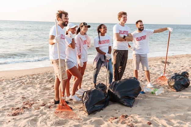 A group of diverse volunteers cleaning up a beach after a surfing competition in Fernando de Noronha, Brazil. They are collecting plastic waste and debris, highlighting the importance of environmental conservation and community involvement.