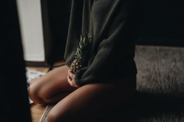 A close-up shot of hands in a meditative pose, resting gently on knees, symbolizing tranquility and focus.
