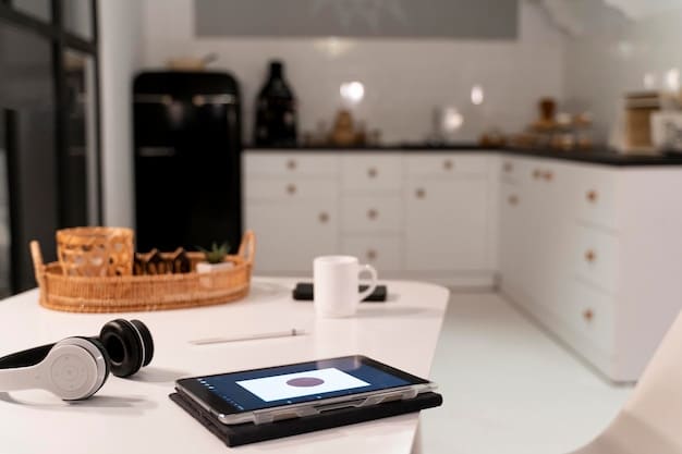 An open-concept kitchen and living room featuring a modern smart home setup. A smart hub is visible on a counter, connecting to various appliances. Soft, natural lighting enhances the ambiance.