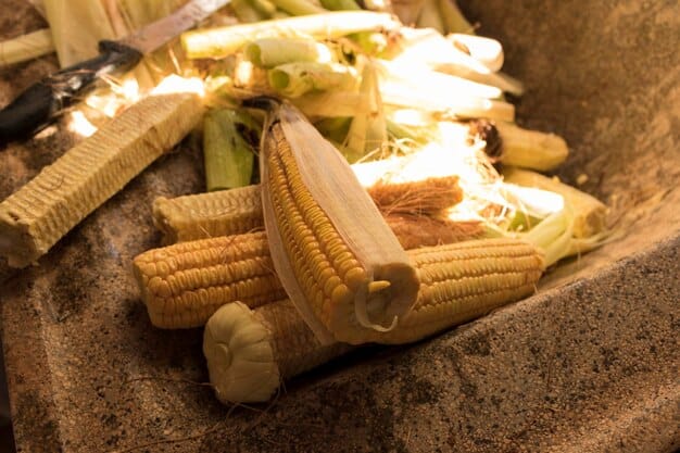 A close-up of a Festa Junina table overflowing with traditional foods such as 
