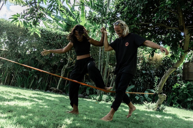 A dynamic shot of Mestre Bimba teaching capoeira, highlighting his role in modernizing the art and solidifying its techniques.