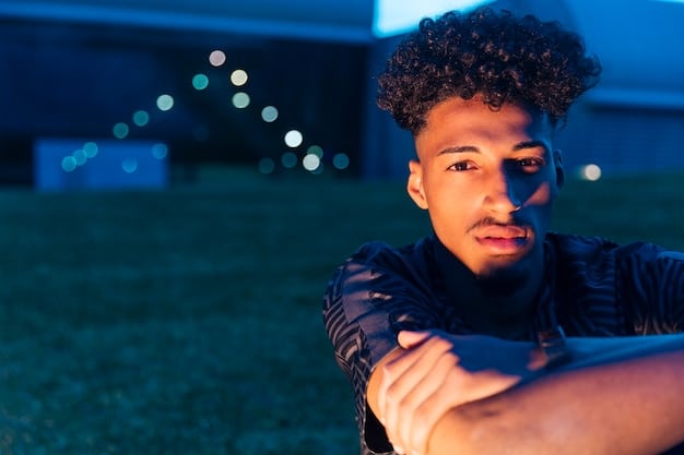 A close-up shot of a young Brazilian soccer player, focused and determined, training on the field, showcasing the dedication and hard work behind their success.